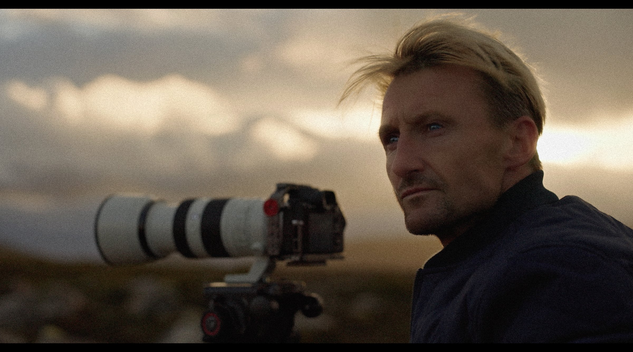 Paul Henri behind the scenes with a cinema camera
